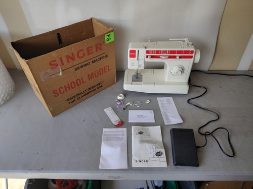 Singer sewing machine school - singer,