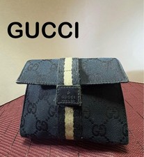 Gucci Pochette con patta in