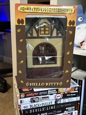 Hello Kitty Action Retro Casa