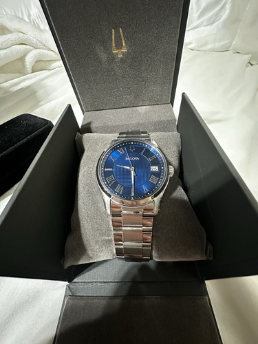 Blue and silver - bulova, with