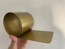 Reggilibro di design in metallo, colore oro