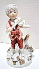 Statuina porcellana bambino