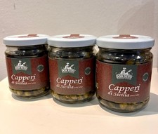 Capperi raccolti a mano