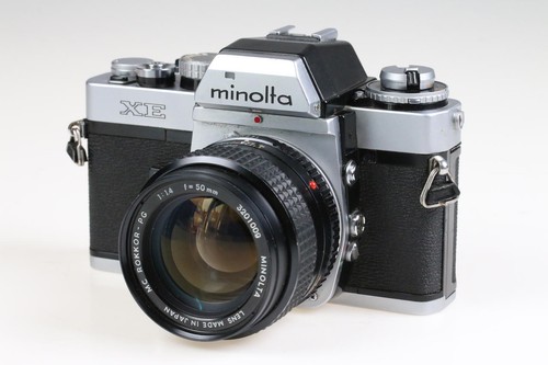 Minolta con f 1 - xe, mc