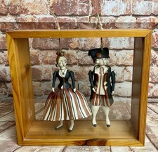 Coppia di pupazzi in ceramica