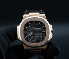 Patek Philippe 5712R-001 Nautilus fasi lunari oro rosa 18 carati scatola/carta 40 mm