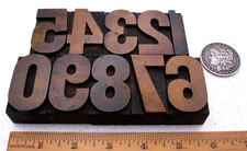 Grande tipografia vintage tipo legno numeri 0-9 e $. Bellissima patina!