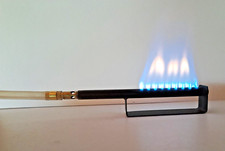 Bruciatore a gas per macchine