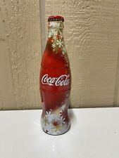 Bottiglia Coca Cola avvolta