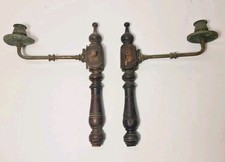 Coppia di antiche applique da