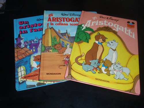 Gli aristogatti la - -,