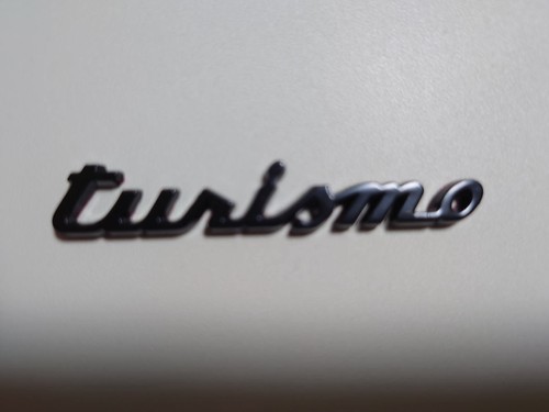 Genuine designturismo metal - designturismo,
