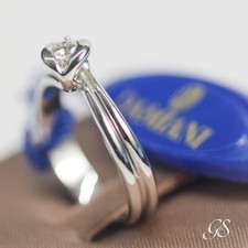 Anello solitario Damiani oro