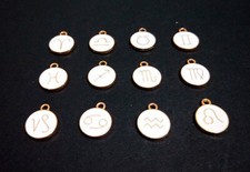 ciondoli segno zodiacale in metallo smaltato 12mm colore bianco,oro bijoux 