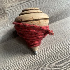 Trottola in legno. Con cordino