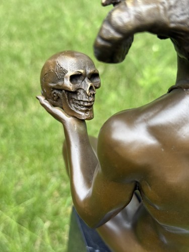 Statua bronzo satiro teschio