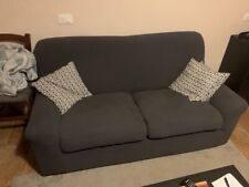 Vendo divano 2 posti usato colore Blu ma con copridivano compreso