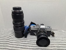 Minolta SRT-202 **LEGGI**