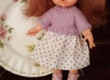 Gonna a pois e golf coordinato