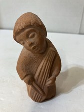terra cotta carved figurine