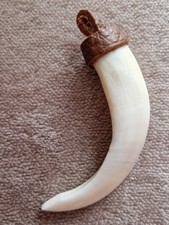 Autentico ciondolo dente di