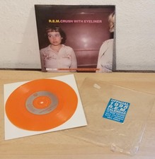 R.E.M. : CRUSH WITH EYELINER  -  1995 Lim.Numb. Calendar Bag Orange Vinyl UK 7"