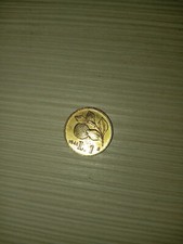 Moneta rara 1 lira 1946 con arancia, color oro, ottimo stato