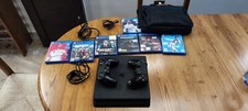 PS4 slim+ 2 joypad+custodia+cavi HDMI+cavo ricarica+7 Giochi 