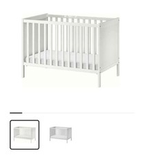 Lettino bianco con sbarre   +