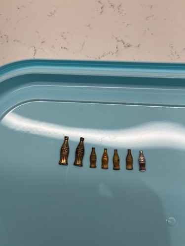 Metal coke bottles - coke,