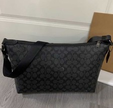 Borsa a tracolla Coach in tela firmata CAJ91 nera NUOVA