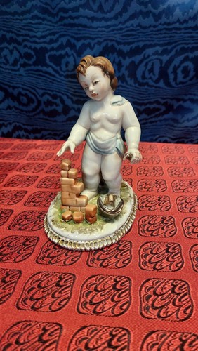 Scultura putto amorino - putto,