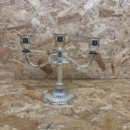 Antico candelabro triplo