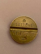 GETTONE TELEFONICO CMM 7806 CON RETRO A ROVESCIO: TELEFONO GIRATO, RARO, BELLO.