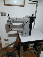macchina da cucire triplice trasporto 