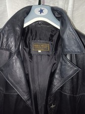 GIACCA LUNGA IN  PELLE  DA DONNA BUONO STATO taglia L,colore nero