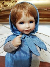 **Bambola di porcellana