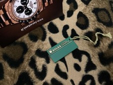 1999 A ROLEX GREEN PRICE TAG