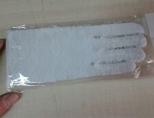 1 paio di guanti bianchi