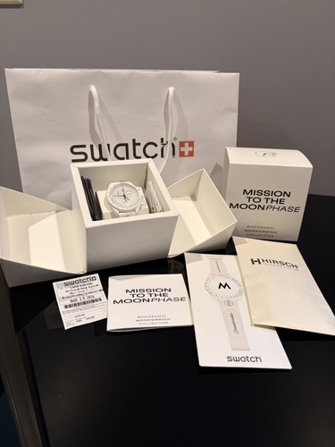 Swatch omega snoopy - swatch,
