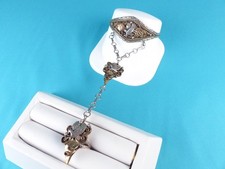 Anello e bracciale schiavo
