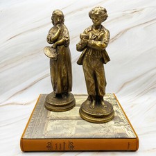 BORGHESE Coppia di statuine vintage rinascimentali italiane in gesso finitura metallizzata