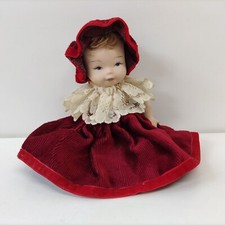 BAMBOLA DI PORCELLANA DI