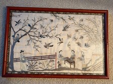 Antica figura cinese in seta