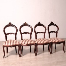 Quattro antiche sedie in noce