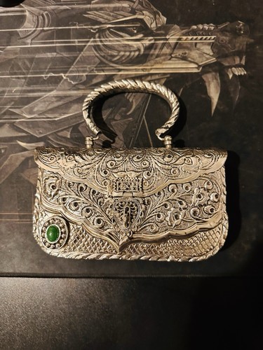 Pochette metallo fatta a - in,