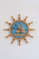 Orologio in legno da parete