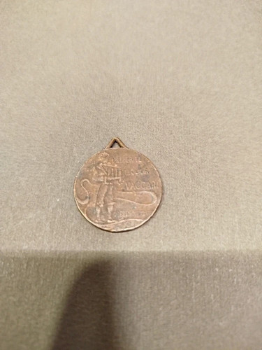 Medaglia pubblicitaria liquori