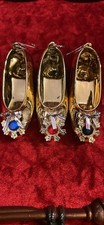 Pantofole tono oro con gemme