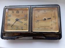 Orologio e barometro da